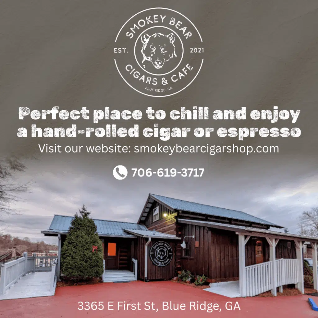 Digital ad for Smokey Bear Cigars & Café featuring the storefront in Blue Ridge, Georgia.