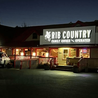 Exterior of Rib Country BBQ in Blairsville, Georgia, a popular local barbecue restaurant.
