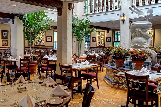 Family enjoying dinner together at a casual restaurant in St. Augustine, Florida.