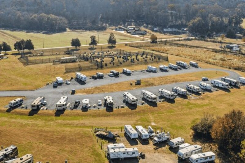 Aerial view of RV sites and open fields at Cedar Creek RV & Outdoor Center
