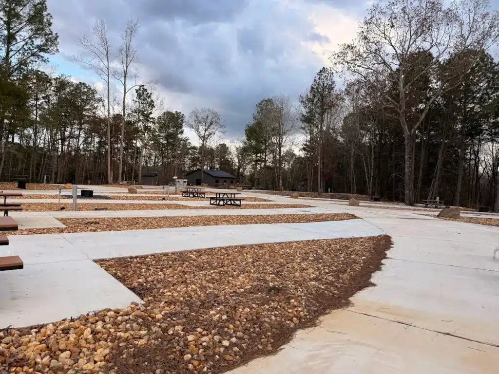 Spacious RV sites at Nestle Inn RV Resort with concrete pads.