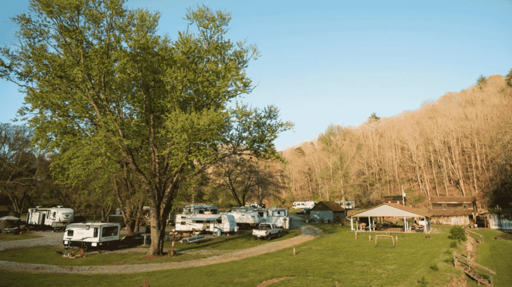 RV sites and open grassy campground area at Skeenah Creek Campground & Mill in North Georgia