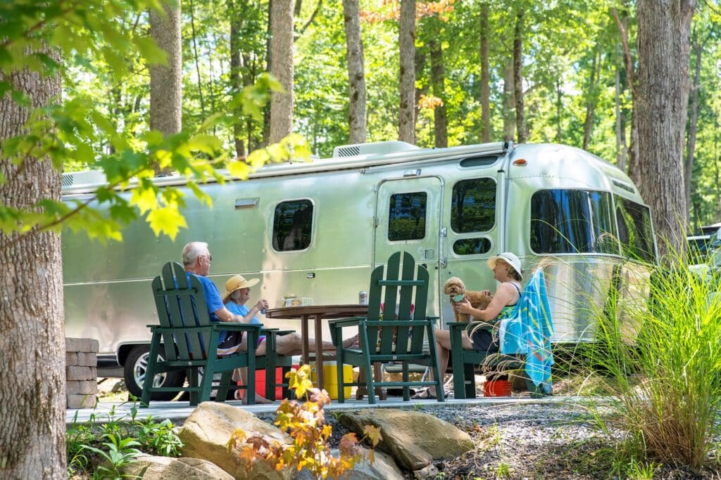 RV camping at Smoky Mountain KOA Holiday surrounded by trees